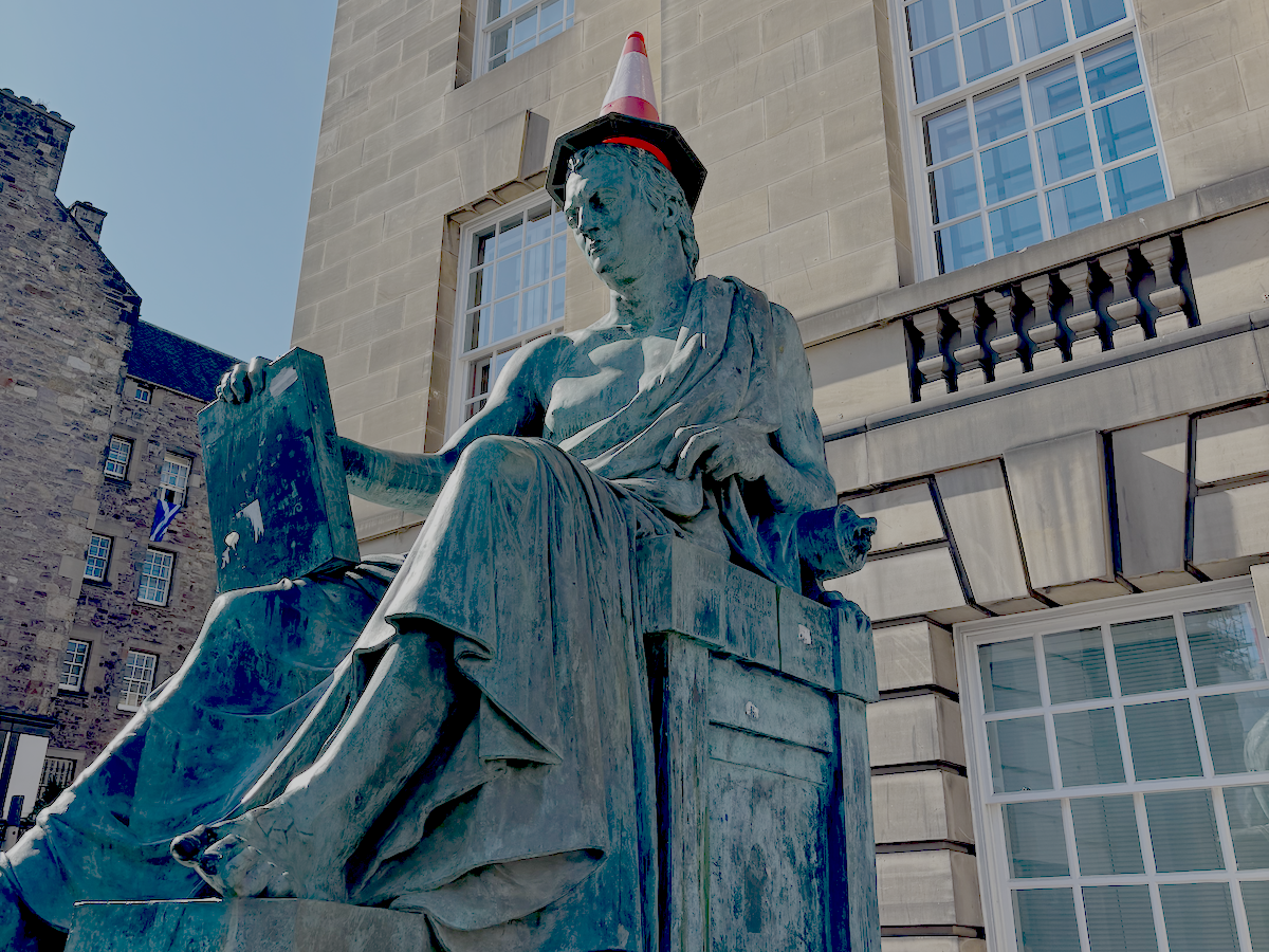 Traffic cone on a statue head in Edinburgh